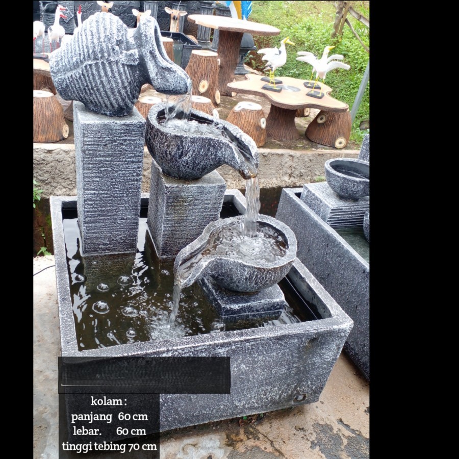 kolam air mancur minimalis motif batu